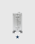 Dallas Cowboys Limited Edition Time Capsule Case, sleek silver design with wheels and logo, perfect for fans and players.
